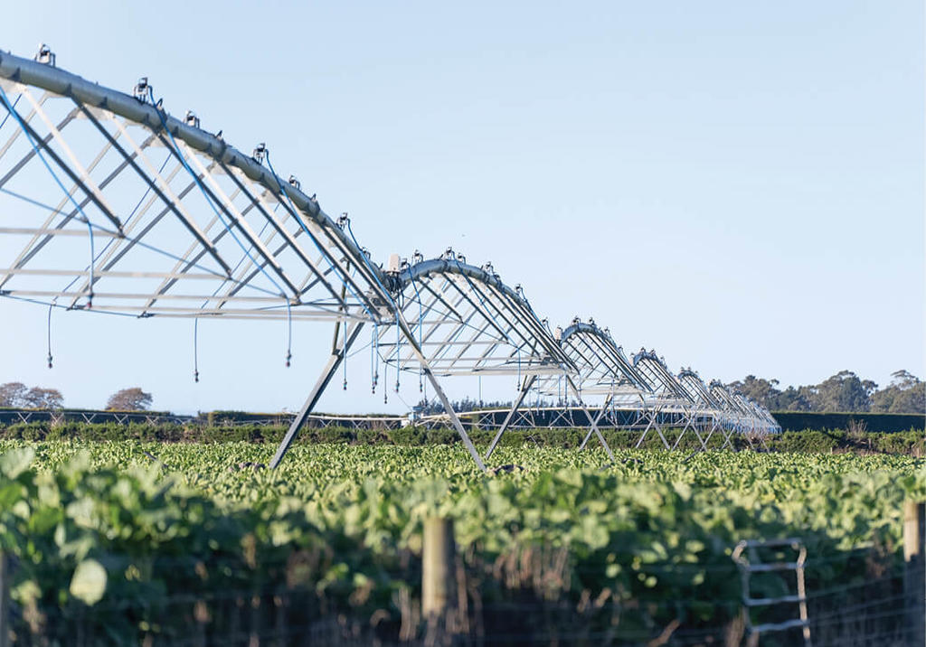 An irrigator in a field ready to spray