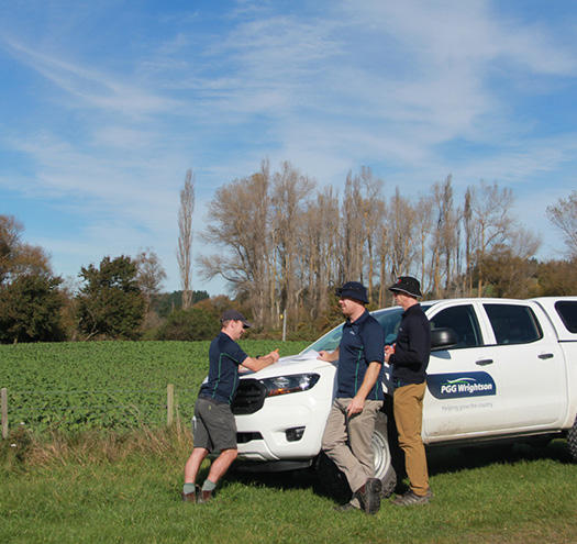 Staff standing by a truck undertaking training