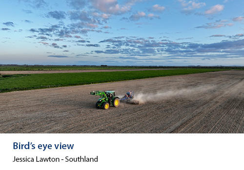 An areal view of a tractor in a field