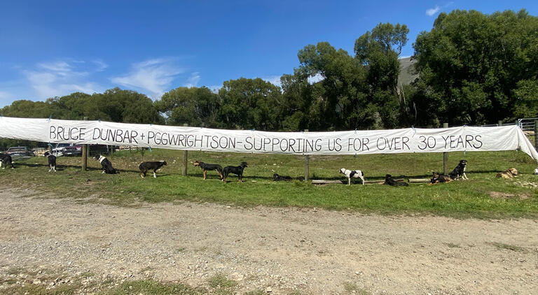 A banner on a fence celebrating 30 years of lamb sales