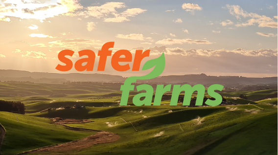 Safer Farms logo superimposed over a farm with rolling green hills